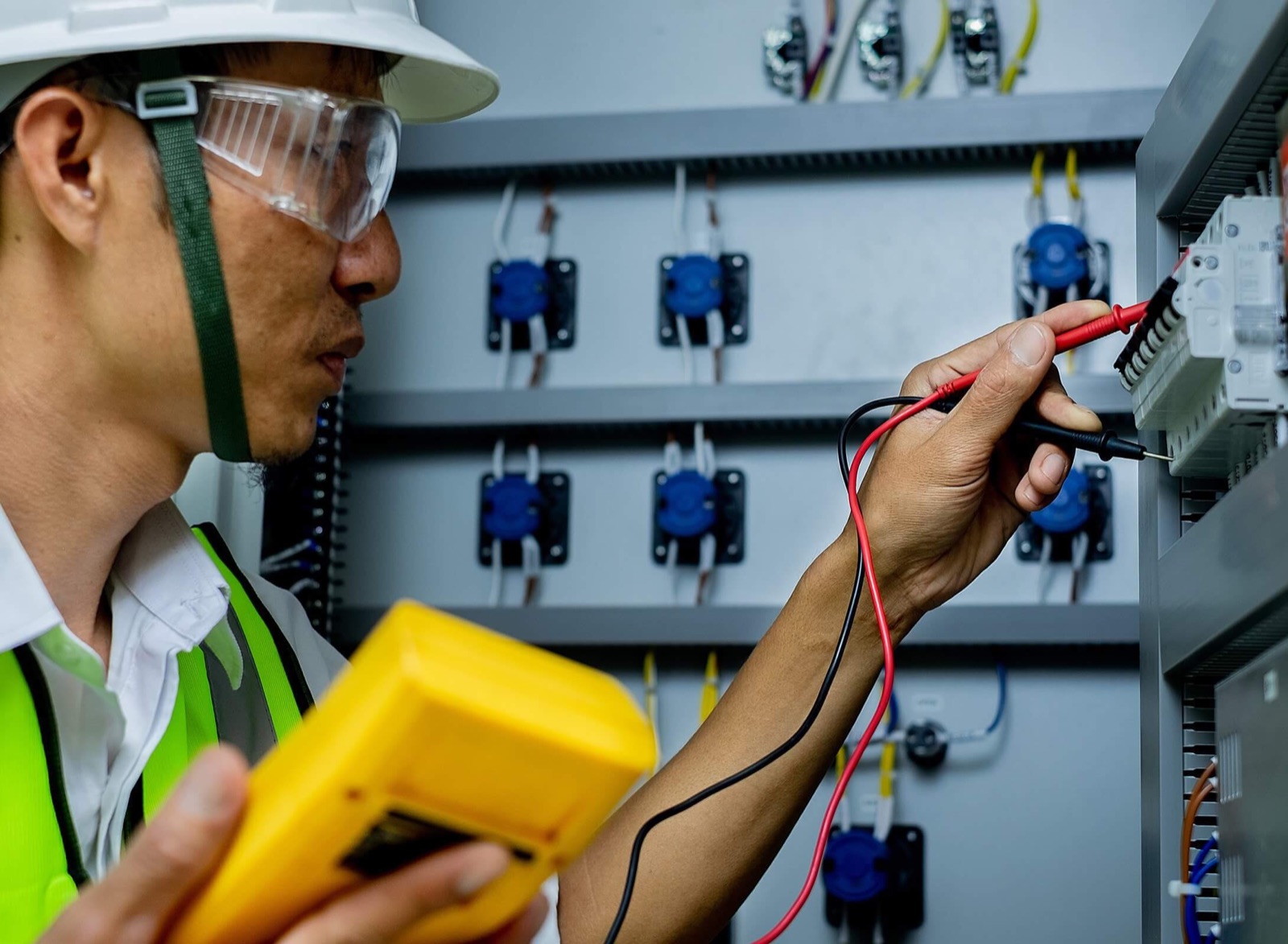 Electrician reviewing plans before starting work